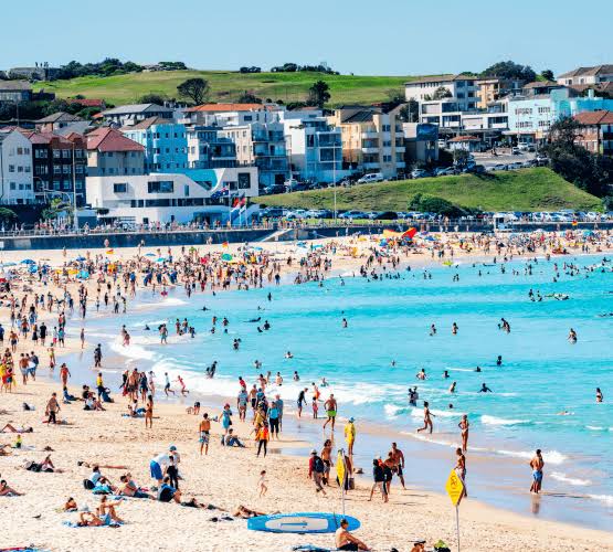 Crowds swimming and sunbathing at Bondi Beach, Sydney